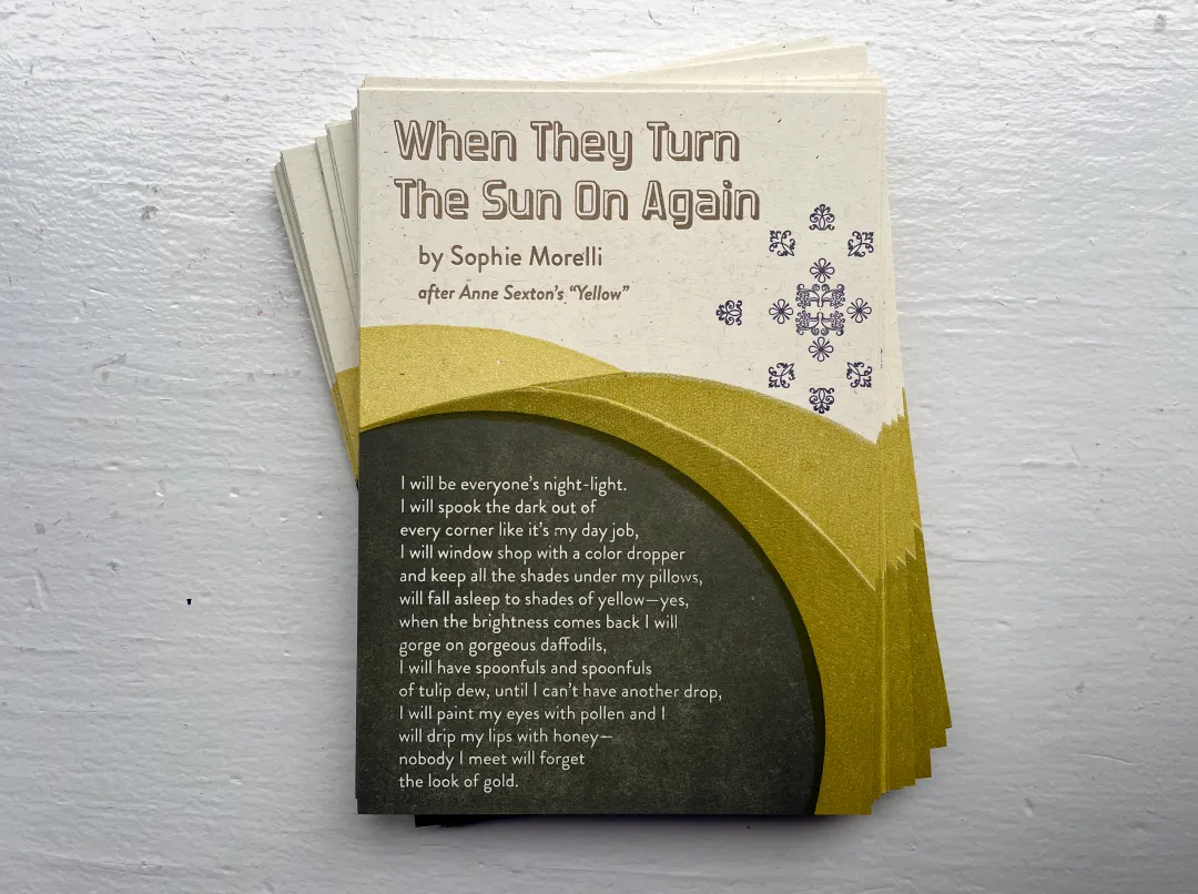 Pile of postcards with a poem called "When They Turn the Sun on Again" by Sophie Morelli